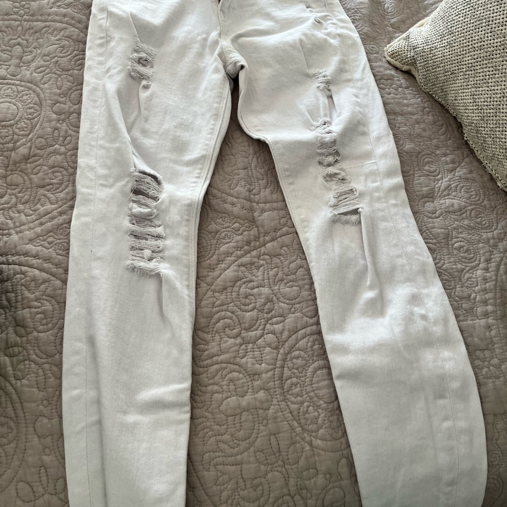 White jeans with rips